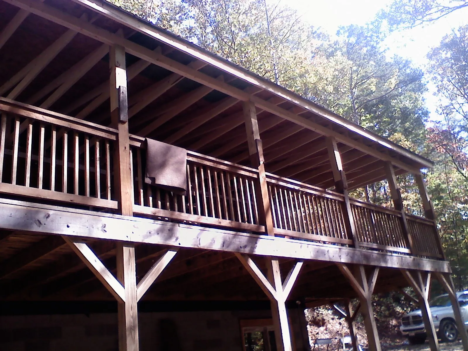 Timber framing under a new elevated porch and deck — Roof Leak Repair in Herington by Roofing Brothers